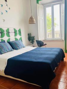 Postel nebo postele na pokoji v ubytování Peniche Hostel