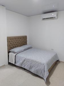 Postel nebo postele na pokoji v ubytování Cabaña Provenza