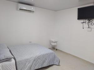 Postel nebo postele na pokoji v ubytování Cabaña Provenza
