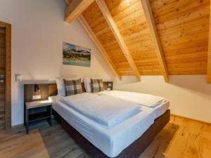 Posteľ alebo postele v izbe v ubytovaní Mountain Chalet Chapeau