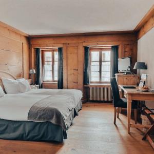 Postel nebo postele na pokoji v ubytování Romantik Hôtel l'Etoile
