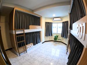 Postel nebo postele na pokoji v ubytování KPOP Hostel