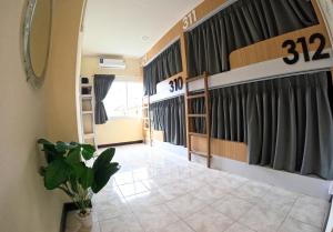 Postel nebo postele na pokoji v ubytování KPOP Hostel