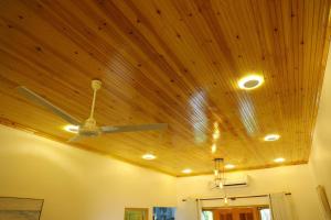 a ceiling with a ceiling fan in a room at Lone Star Residence in Jaffna