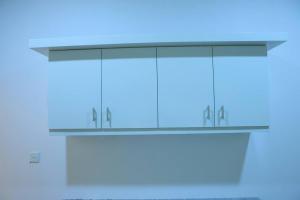a close up of a shelf with three hooks at Lone Star Residence in Jaffna