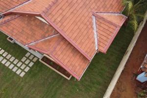 an overhead view of a house with an orange roof at Lone Star Residence in Jaffna
