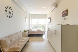 Ruang duduk di Comfortable Villa Morra Loft