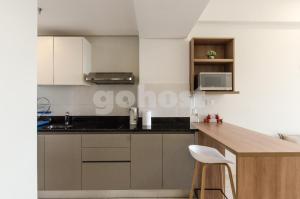 Dapur atau dapur kecil di Comfortable Villa Morra Loft