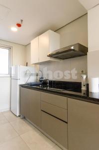 Dapur atau dapur kecil di Comfortable Villa Morra Loft