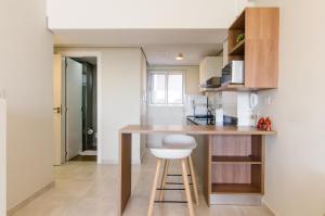 Dapur atau dapur kecil di Comfortable Villa Morra Loft
