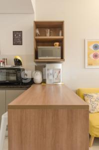 A kitchen or kitchenette at Unbeatable Studio W Pool, Wifi In Villa Morra
