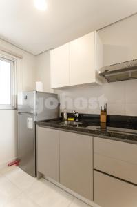A kitchen or kitchenette at Unbeatable Studio W Pool, Wifi In Villa Morra