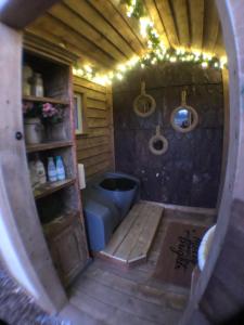 an outside view of a small bathroom with a tub at Alabaster Acres in Caledon