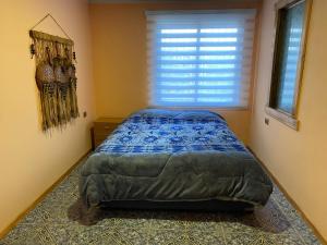 Postel nebo postele na pokoji v ubytování Alojamiento Pichidangui