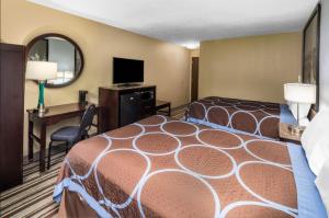 Voodi või voodid majutusasutuse FairBridge Inn Express Nyack toas