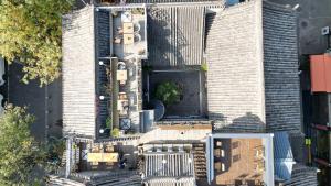 una vista aérea de dos edificios altos en una ciudad en Xi'an Simple Palace en Xi'an
