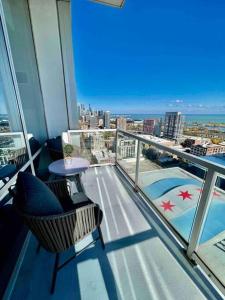 a balcony of a building with a view of the city at Penthouse In South Loop Chicago in Chicago
