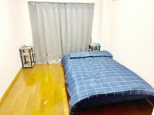 En eller flere senge i et værelse på Shibuya Honmachi Hana House