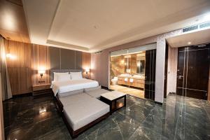 Taman Prakerti Bhuana Hotel客房内的一张或多张床位