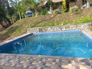 Bazén v ubytování Coffee Street Homestay Sakleshpur nebo v jeho okolí