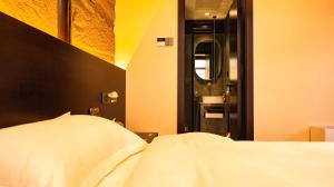 Letto o letti in una camera di Yangzhou Aihehua Boutique Homestay