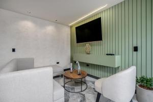 TV a/nebo společenská místnost v ubytování Apartamentos HOUSY Laureles