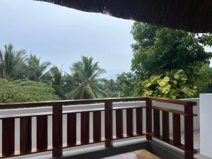 a view from the balcony of a villa at Bohol Coastal View Hotel in Tawala