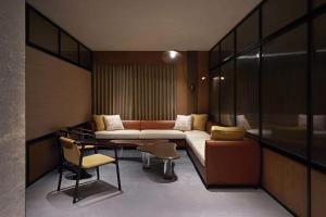 Et sittehjørne på Artisse Place - Access to 4000 sqm Fusion Wellness Centre and 800 sqm Indoor Swimming Pool