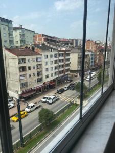 a view of a city street from a window at Ecemsuit2 in Yomra