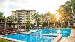 Bazén v ubytování Condo en Jacó nebo v jeho okolí + 26 fotografií