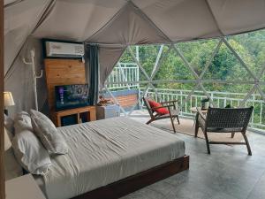 Voodi või voodid majutusasutuse Moondock Luxury Camp toas