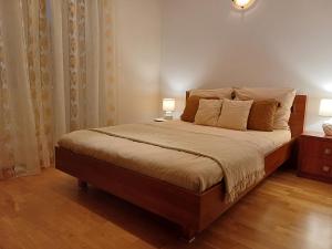 Posteľ alebo postele v izbe v ubytovaní Apartament pod Nosalem
