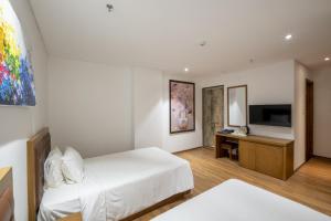 Hai Trieu Hotel客房内的一张或多张床位