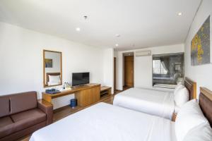 Hai Trieu Hotel客房内的一张或多张床位