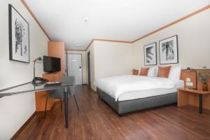 Postelja oz. postelje v sobi nastanitve HOTEL ENGEL LIESTAL - Business & Lifestyle
