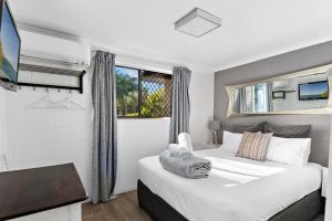 Postel nebo postele na pokoji v ubytování Buderim Fiesta Motel + 37 fotografií