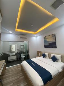 מיטה או מיטות בחדר ב-Dong Hai Hotel _ Rach Gia