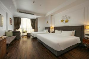 Voodi või voodid majutusasutuse Hanoi Allure Hotel toas