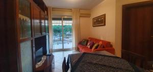 Χώρος καθιστικού στο Apartment near the beach