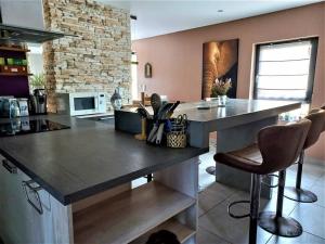 Η κουζίνα ή μικρή κουζίνα στο Le Pavillon Alsacien