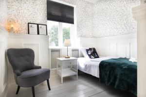 Voodi või voodid majutusasutuse Velling Koller Hotel og Camping toas