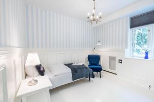 Voodi või voodid majutusasutuse Velling Koller Hotel og Camping toas