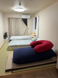 Postel nebo postele na pokoji v ubytování 水之道