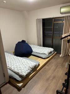 Postel nebo postele na pokoji v ubytování 水之道