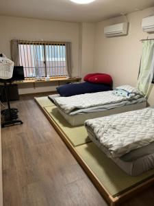 Postel nebo postele na pokoji v ubytování 水之道