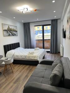 Postel nebo postele na pokoji v ubytování Snow Twin Flats Gudauri