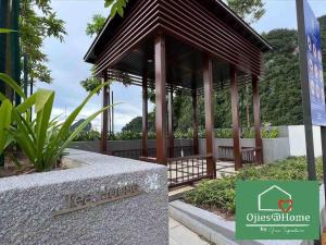 淡文Ojieshome 1BR Sunway Onsen Tambun的前方有标志的凉亭