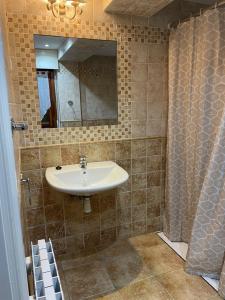 Koupelna v ubytování Hotel Kaia