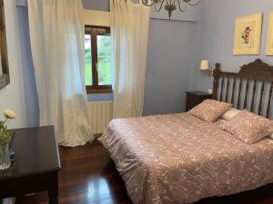 Postel nebo postele na pokoji v ubytování Hotel Kaia
