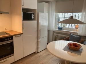 Kuchyň nebo kuchyňský kout v ubytování Ferienwohnung Götz